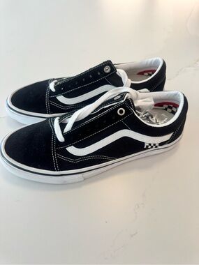 Vans Black and White Classic Low Top Sneakers